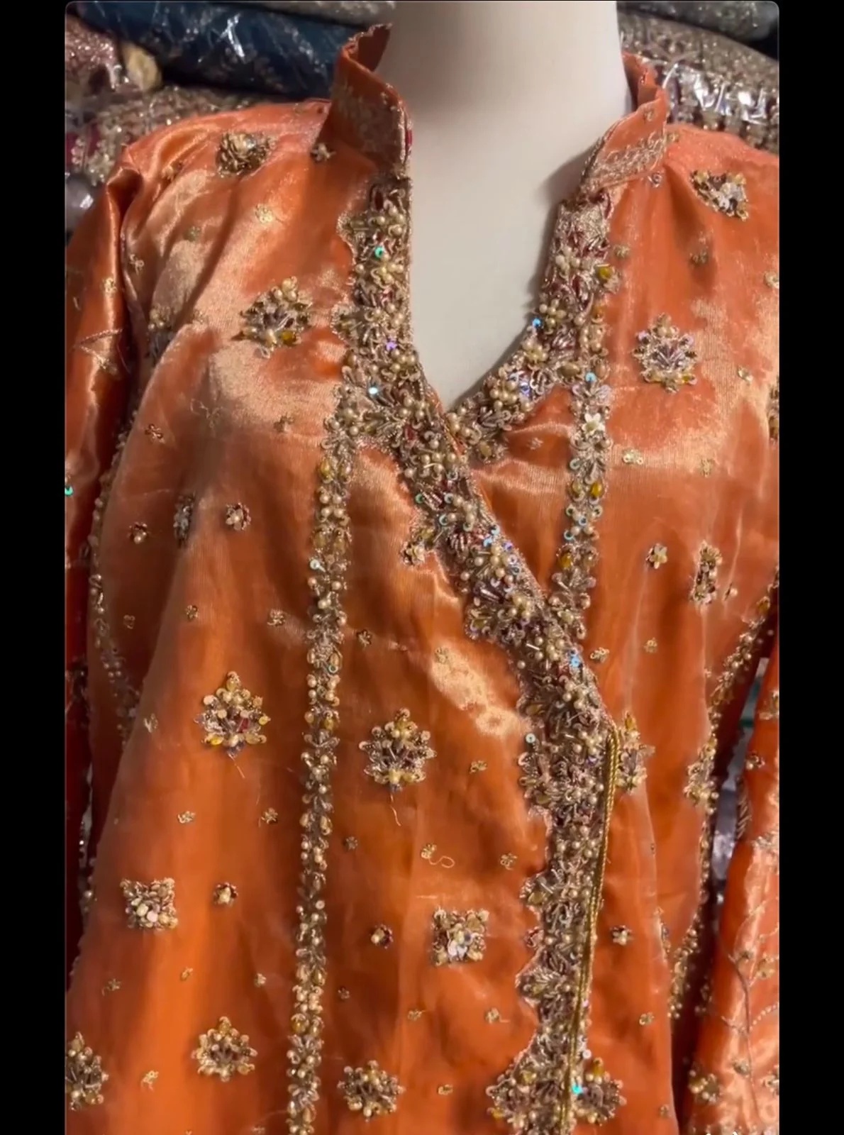Haris Shakeel Aswad Pakistani fashion outfit in gold tones.